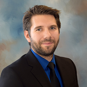 David Shelton in a suit and tie