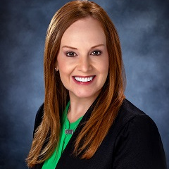 Amanda Lansford of Treasury Management in a suit