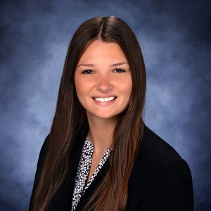 Sarra Faust in a suit